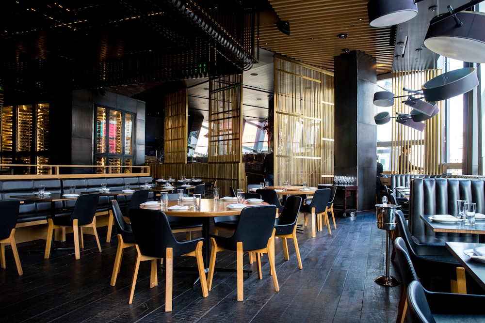 Tables and chairs inside a restaurant